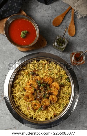 shrimp, Rice, Majboos food international Cuisine Arabian Gulf.
Quick and healthy rice, fresh with shrimps, lime and vegetables. A view of a shrimp fried rice, in a restaurant or kitchen setting.
 Royalty-Free Stock Photo #2255085077
