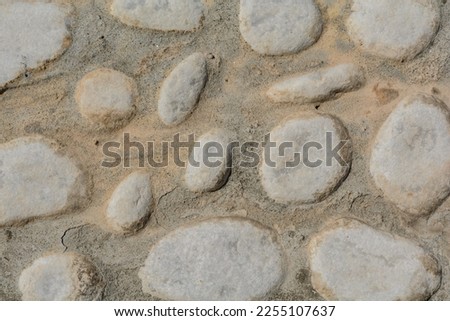 Concrete boulders give patterns as a background