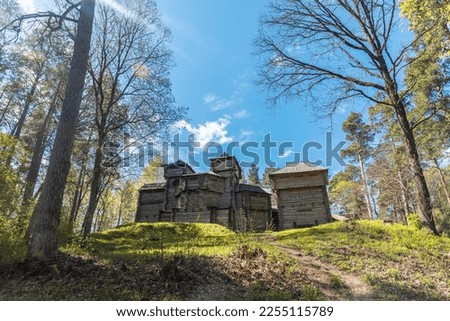 View to reconstruction of ancient 12th century wooden castle in Tervete, Latvia Royalty-Free Stock Photo #2255115789