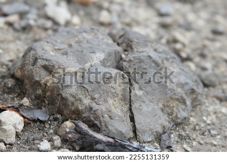 low angle close up of rocks on the road 