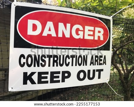 "danger construction area keep out" sign