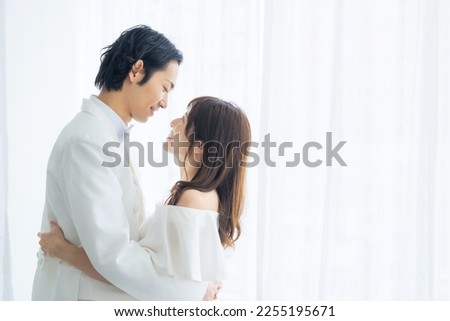 Asian couple getting married. Bridal photo. Photo wedding. Photo studio. Royalty-Free Stock Photo #2255195671