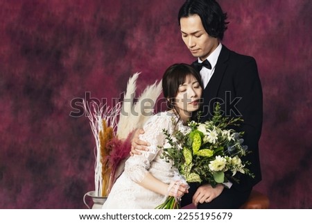 Asian couple getting married. Bridal photo. Photo wedding. Photo studio.