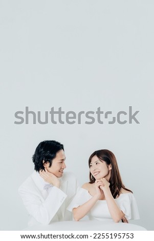Asian couple getting married. Bridal photo. Photo wedding. Photo studio. Royalty-Free Stock Photo #2255195753