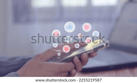 Hand using smartphone, social media concept