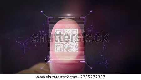 Composition of qr code over finger on black background. Global technology, computing and digital interface concept digitally generated image.