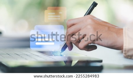 Human hand using a laptop computer,Conversation in the chat box icon,social media creation ideas,Chatting and commenting with social networks ,response and chat customer service,online communication Royalty-Free Stock Photo #2255284983