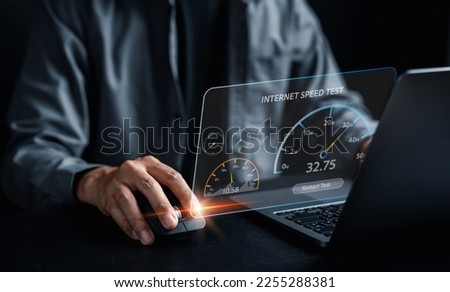 Super Fast internet connection speedtest bandwidth network technology, Man using Internet high speed by smartphone and laptop computer, 5G quality, speed optimization. Royalty-Free Stock Photo #2255288381