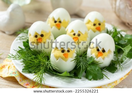 Funny eggs chicks. Easter idea for breakfast. Healthy appetizer for easter table. selective focus
