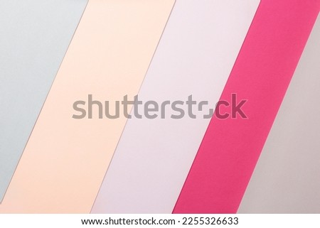 Abstract Viva Magenta and Complementary Colored Paper Textures Minimalist Background. Geometrical multicolored paper flat lay background. Viva Magenta. Minimalism, geometry and symmetry template.