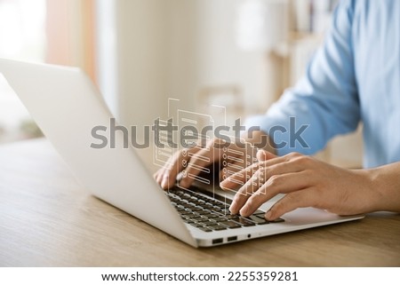 Businessman working with laptop a symbol of top service ISO Certification Document Management System Quality assurance.
