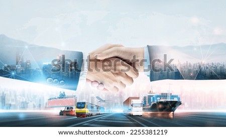 International business logistics transportation teamwork concept, double exposure of handshake partnership import export delivery background and modern futuristic of container cargo freight ship truck Royalty-Free Stock Photo #2255381219