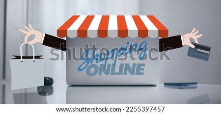 Laptop on white desk. Graphics with credit card and shopping bag in hands. Online e-commerce concept