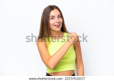 Young caucasian woman isolated on white background celebrating a victory Royalty-Free Stock Photo #2255452617