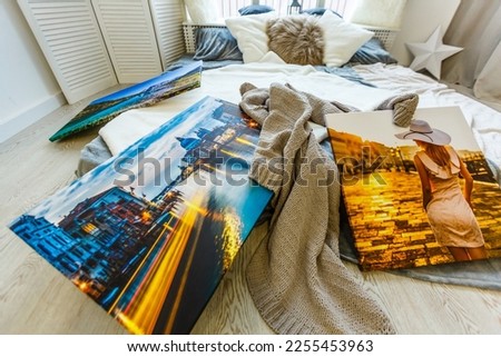 Canvas print in the room. Photo with gallery wrap method of canvas stretching on stretcher bar. Interior decor