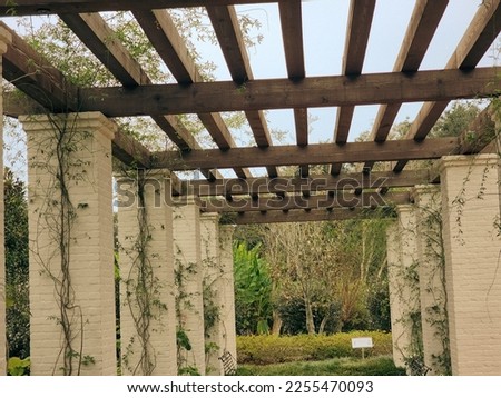 lush garden with pillar structure