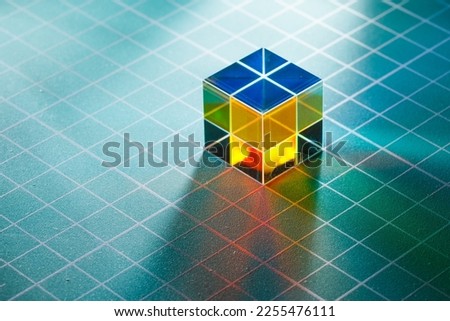 abstract dichroic cube prism with light spectrum dispersion