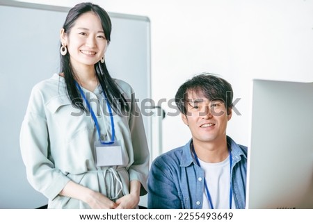 Male and female office workers having a meeting in the office