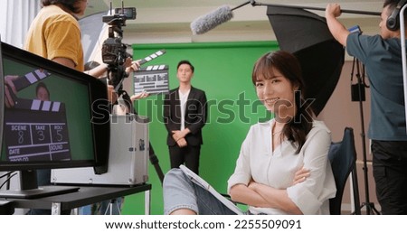 portrait Female Asian director showing satisfaction and confident looking at you Royalty-Free Stock Photo #2255509091