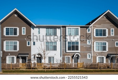 Residential townhouses. Modern apartment buildings in BC Canada. Modern complex of apartment buildings. Concept of real estate development, house for sale and housing market. Nobody, street photo