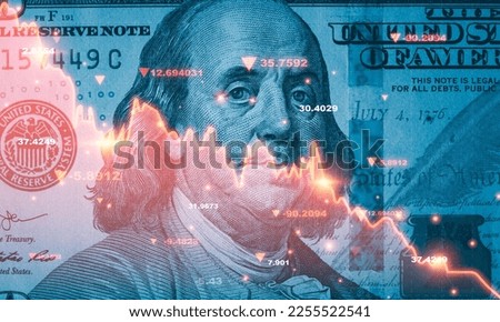 Benjamin Franklin face on USD dollar banknote with red decreasing stock market graph chart for symbol of economic recession crisis concept. Royalty-Free Stock Photo #2255522541