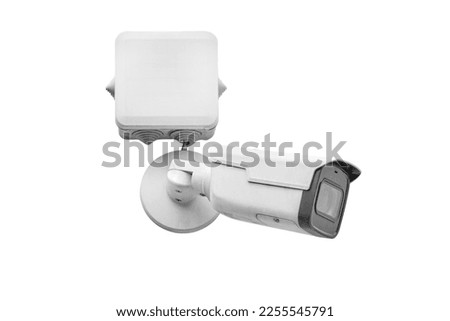 Video surveillance camera on the building, monitoring the security, isolated on a white background