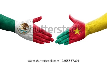 Handshake between Cameroon and Mexico flags painted on hands, isolated transparent image.