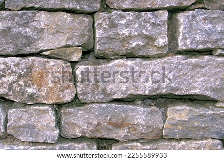 Facade in Germany, brick wall, sand brick stone. History of West Germany, architecture and construction. Background or banner