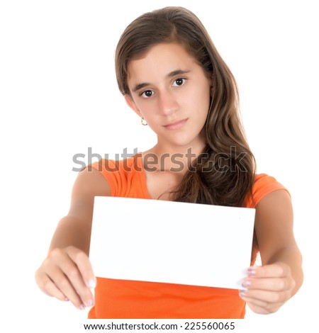 Hispanic teenage girl holding a blank sign with space for text