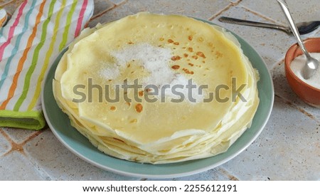 pile of pancakes on a plate