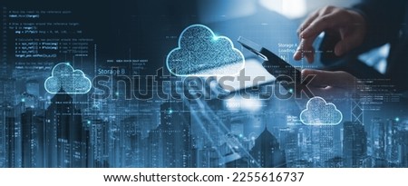 Businessman touching cloud computing network. Cloud technology, edge computing technology and data storage for business network, data backup of business intelligence on internet, data storage network. Royalty-Free Stock Photo #2255616737