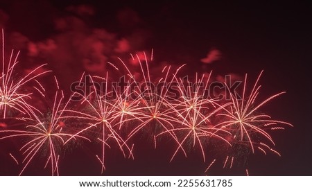 Various colorfull Fireworks in action for celebration new year background banner on dark night sky with space for text