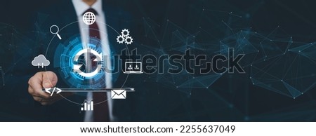 Businessman hold laptop with Update Software Computer Program Upgrade Business Technology Internet, Update on virtual screen. Internet and technology concept, loading bar with installing the update. Royalty-Free Stock Photo #2255637049