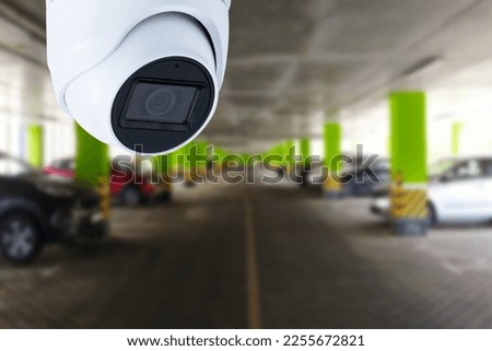 CCTV Security Camera setup on Parking lot. Copy space