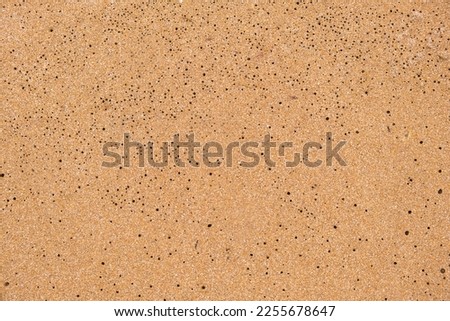 Sand orange, yellow, in a hole. Beautiful background and place for text. Copy space. High quality photo