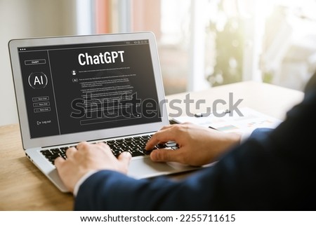Data search concept using artificial intelligence chatbot ChatGPT, young businessman chatting with smart chatbot To find business economic information, artificial intelligence developed by OpenAI. Royalty-Free Stock Photo #2255711615