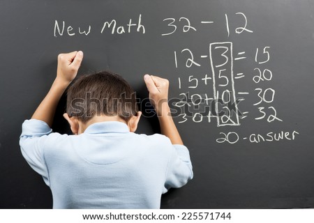 Frustrated at the new math. Royalty-Free Stock Photo #225571744