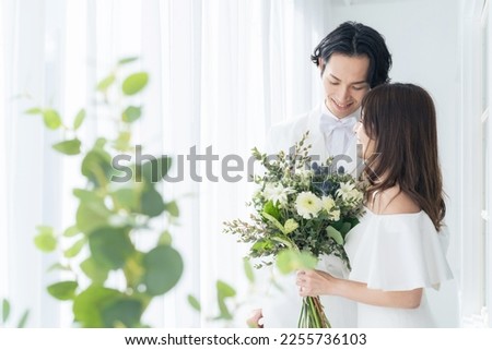 Asian couple getting married. Bridal photo. Photo wedding. Photo studio. Royalty-Free Stock Photo #2255736103