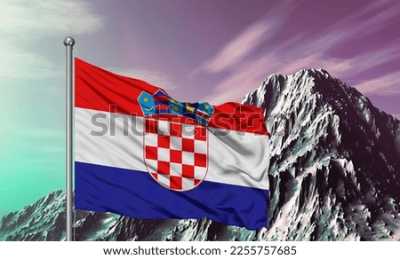 Croatia national flag cloth fabric waving on beautiful mountain background.