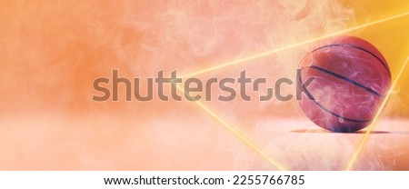 Composite of illuminated triangle and basketball isolated on orange smoky background, copy space. Sport, competition, illustration, shape and abstract concept.