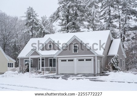 houses in residential community after snow in winter  Royalty-Free Stock Photo #2255772227