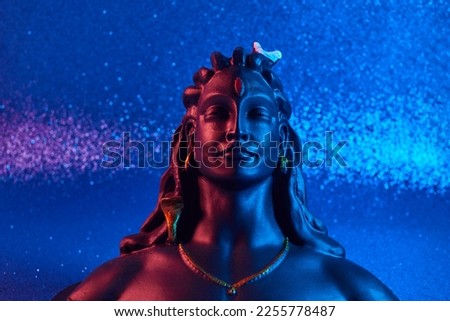 Maha Shivratri, Lord Shiva on blue background.