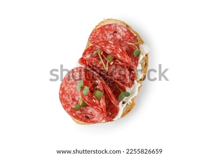 Sandwich, toast with cream cheese, sliced salami, sausage, microgreen isolated on white background with clipping path, cut out. Snack, bruschetta. Royalty-Free Stock Photo #2255826659