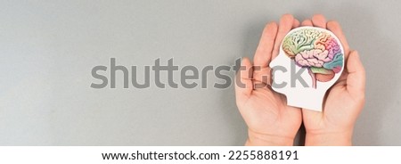 Holding a brain in the hands, Parkinson disease, Alzheimer awardness, mental disorder dementia, psychology problems, adhd, cerebral vein thrombosis Royalty-Free Stock Photo #2255888191