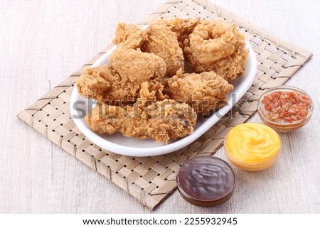 crispy fried chicken with several types of sauce