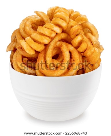 Twister Fries in white plate isolated on white background, French fries on white With clipping path. Royalty-Free Stock Photo #2255968743