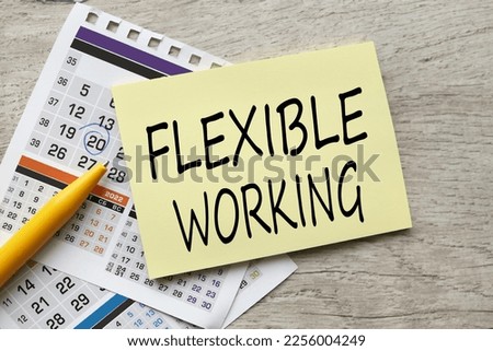 Flexible working policy concept. yellow sticker on calendar pages. sticker text Royalty-Free Stock Photo #2256004249