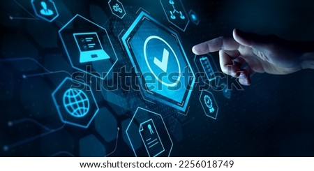 Quality management and validation process. Quality Assurance (QA), Quality Control (QC), certification concept. Compliance to regulations and standards. Finger touching icon on virtual screen. Royalty-Free Stock Photo #2256018749