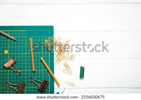 Concept of accessories for patchwork, cutting mat, space for text