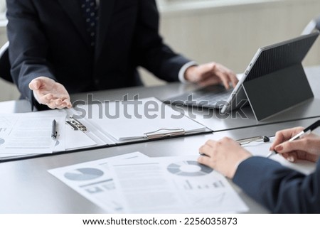 Asian business people having a meeting in a conference room Royalty-Free Stock Photo #2256035873